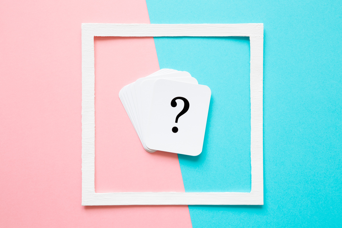 Card of question mark in white frame on pastel pink and turquoise blue background. Soft light color. Teenagers issues. Boys and girls problems and solutions concept.